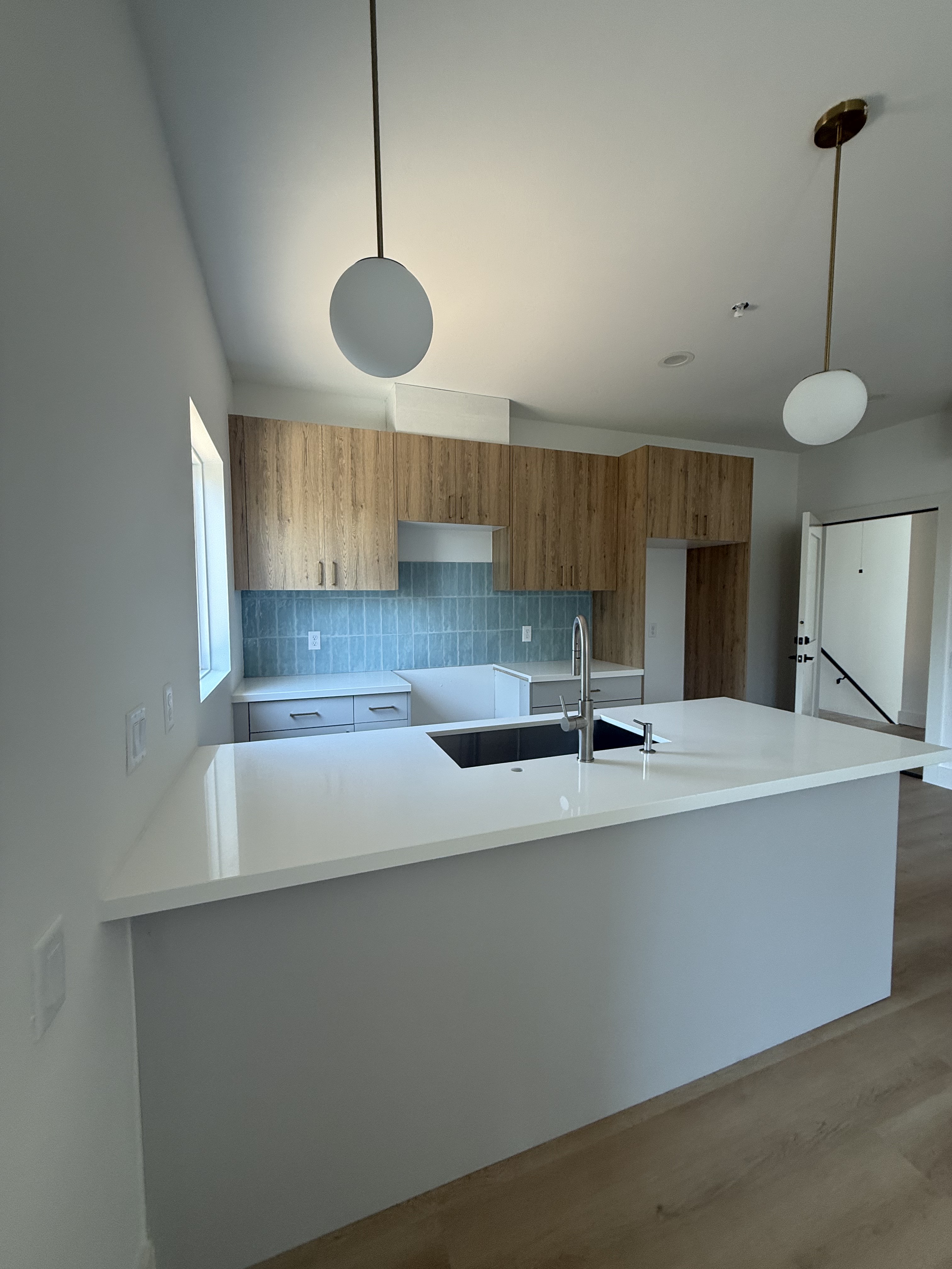 Modern kitchen remodel with wood cabinetry