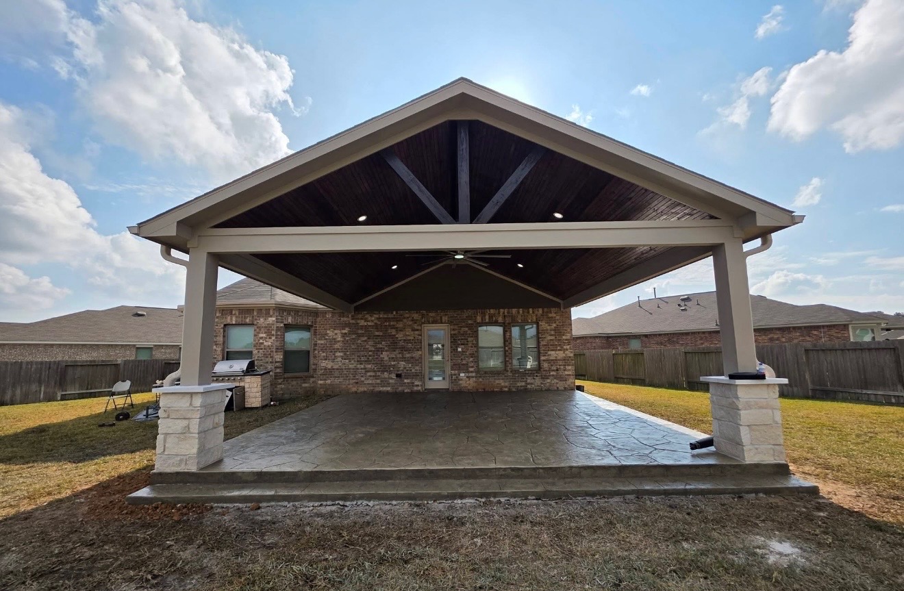 Covered patio with vaulted wood ceiling